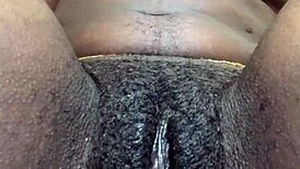 Mysterious Hairy Ebony Girl Fingers Wet Pussy Lips Solo