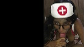 Young latina nurse cares for patient in hospital