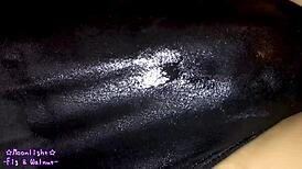 trans crossdresses in navy blue swimsuit slathered slippery lotion