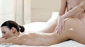 kira zen's juicy natural tits oiled up for sensual scissoring kiss with lesbian masseuse izzy delphine