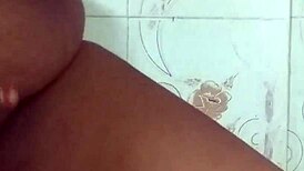Horny Desi wife in saree presses big boobs rubs shaved pussy and pisses