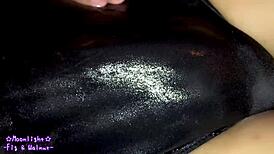 trans crossdresses in navy blue swimsuit slathered slippery lotion