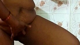 Horny Desi wife in saree presses big boobs rubs shaved pussy and pisses