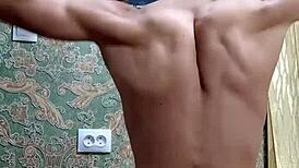 After school, the skinny flexible bodybuilder flexes his toned muscles in homemade amateur display for admirers.