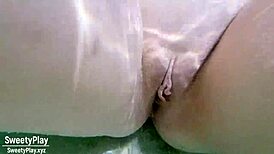 pretty mature wife rubs her shaved big pussy underwater solo