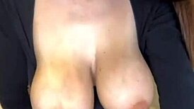 Stepmother exposes her massive milky natural tits during webcam massage session for stepson