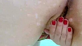 pretty mature wife rubs her shaved big pussy underwater solo