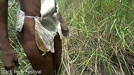 skinny african beauty bends over outdoors showing narrow ass