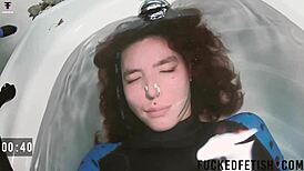 experienced skinny girl teases spandex underwater in slow pool bathtub play