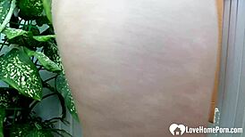 damn horny brunette teen kneels shoving vibrator deep in shaved pussy solo!