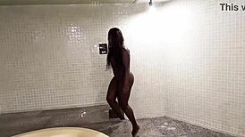 Shiny skinned Brazilian black fitness babe climbs stairs fully nude