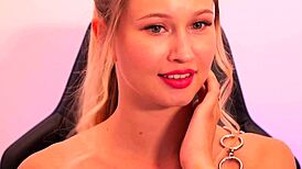 a beauty with red lipstick seductively sucks and fingers herself