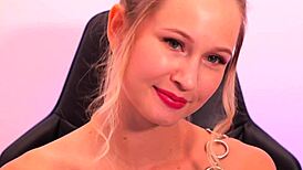 a beauty with red lipstick seductively sucks and fingers herself