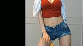 Korean cutie dances sexy showing off her big tits