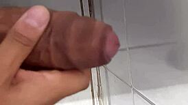 Desperate cuckold husband strokes furiously in bathroom close-up