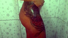 latina esposa strips in shower showing curvy body and pierced nipples