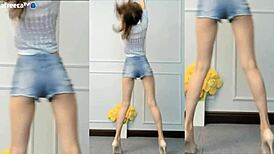 Korean cutie dances sexy showing off her big tits