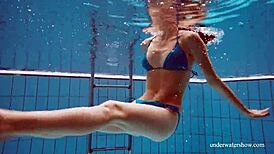 hey check out this tight pussy teen in blue bikini underwater at the beach 🏖️💦