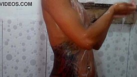 latina esposa strips in shower showing curvy body and pierced nipples