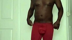 bodybuilder flexes massive chest and abs like living decorations