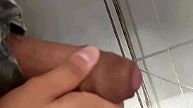 Desperate cuckold husband strokes furiously in bathroom close-up
