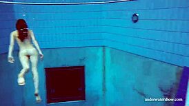 hey check out this tight pussy teen in blue bikini underwater at the beach 🏖️💦