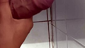Desperate cuckold husband strokes furiously in bathroom close-up