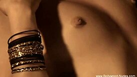 Indian beauty sways nude in erotic teasing dance ritual to sensual music