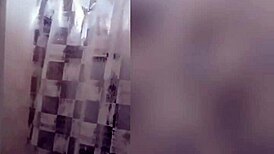 cute latina teen with tattoos showers sensually on webcam