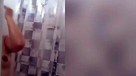 cute latina teen with tattoos showers sensually on webcam