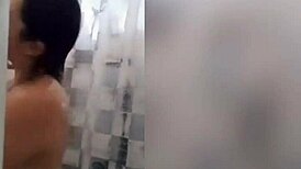 cute latina teen with tattoos showers sensually on webcam