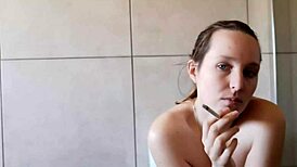 Whoa, Cute Girl Next Door Smokes Seductively In Bathroom!