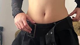 What would you do if you caught this petite teen slut fingering her shaved wet pussy?