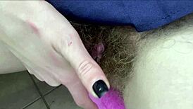 nasty hairy pussy with huge wet clitoris throbs during close-up masturbation orgasm