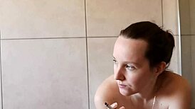 Whoa, Cute Girl Next Door Smokes Seductively In Bathroom!