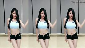 sexy cute chinese girl dances in tight clothes