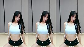 sexy cute chinese girl dances in tight clothes
