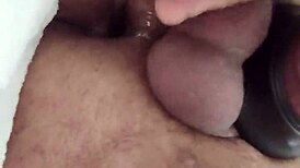 He grabs prostate massager for intense play on pumped cock