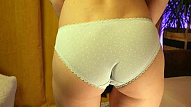 Skinny tall teen caresses her cute panty-covered ass and small tits