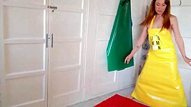 squirting pvc apron fetish slut sprays everywhere from fingering her shaved milf pussy