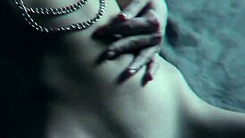 Redhead writhes in horny climax from nipple clamps gag