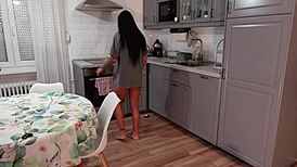 This hot petite brunette babe strips t-shirt and panties flashing tight shaved pussy and ass