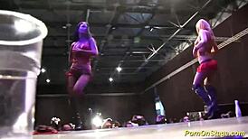 Three sluts share huge cocks on public stage in wild orgy dancing and riding reality show.