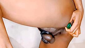 chastity cage holds back while she takes standing fuck