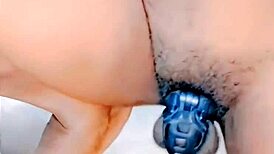 chastity cage holds back while she takes standing fuck