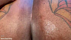 Big booty country milf from USA teases with her tattooed curves
