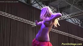 Three sluts share huge cocks on public stage in wild orgy dancing and riding reality show.