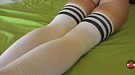 Blonde Sneaker Dangle Turns into Sock Tease with Thong Panties Peek