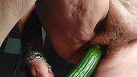 GRANNY'S HAIRY PUSSY FUCKED WITH CUCUMBER!