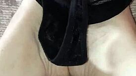 Gretala rubs thong over her sexy ebony barefoot soles